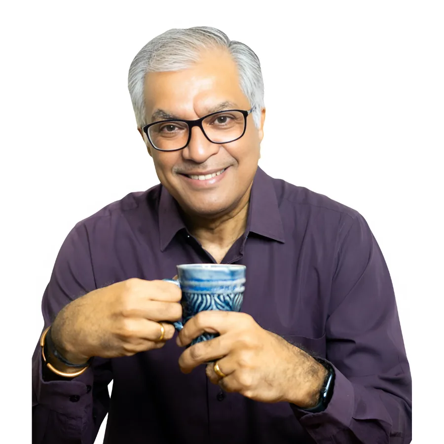 Shailesh Kantak holding a cup of tea